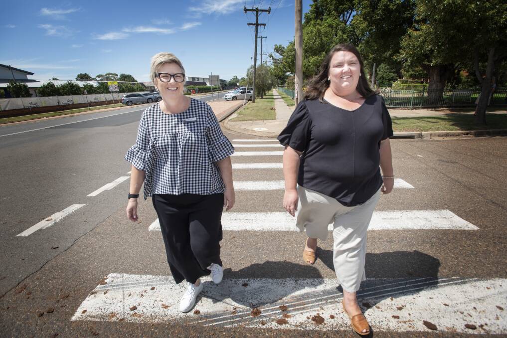 SAFETY FIRST: St Mary's principal Bern Feldman and St Xavier's assistant principal Leanne Herden at the busy crossing on Henry Street. Photo: Peter Hardin