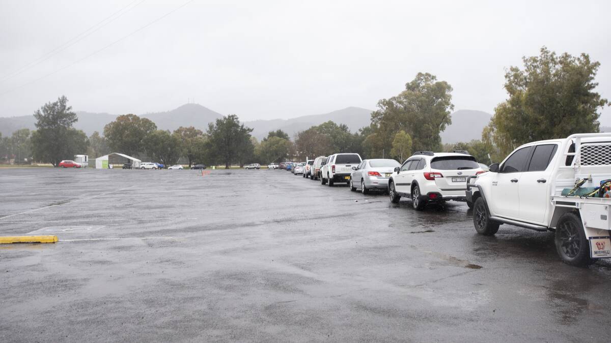 NO NEW CASES: A long line at the Tamworth COVID-19 testing drive through on Thursday. There were no new cases recorded overnight on Sarturday morning. Photo: Peter Hardin 