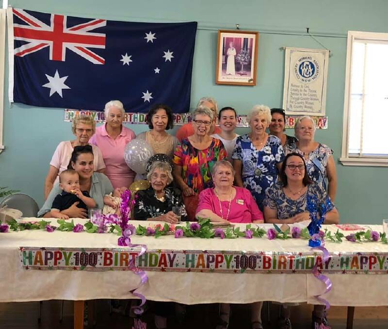 HAPPY BIRTHDAY: Lilian Lee (wearing black in front row) celebrated her 100th birthday on Wednesday with her friends from the Country Women's Association. Photo courtesy of Gunnedah CWA.