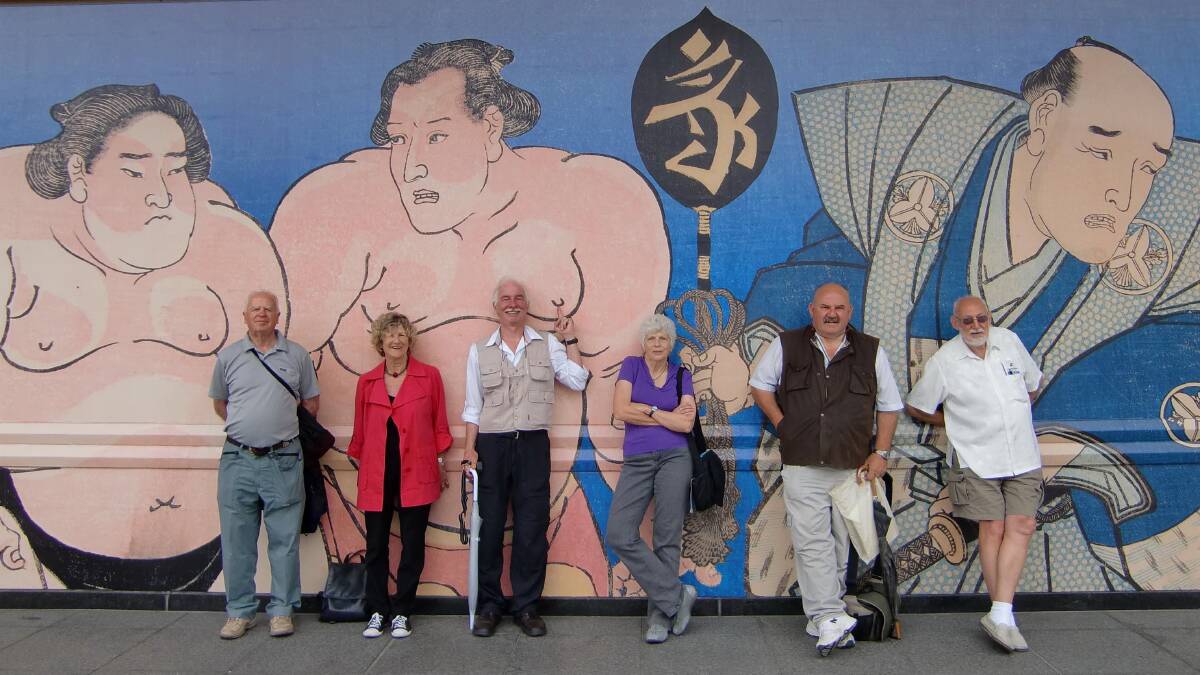 All part of the fun in Japan: Getting to grips with sumo wrestlers the easy way.

