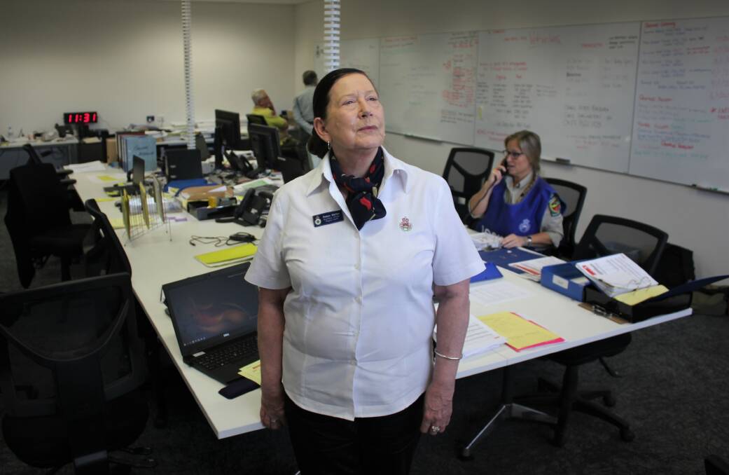 BEHIND THE SCENES: NSW RFS logistics officer Robyn Martyn at the Liverpool Plains Fire Control Centre. Photo: Madeline Link