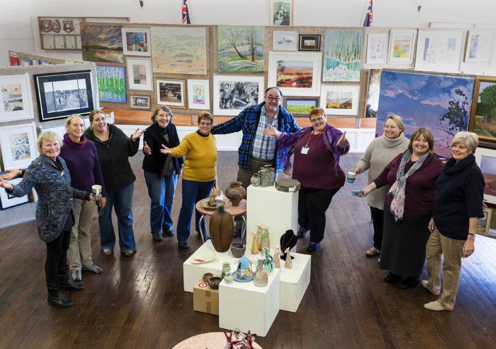 FESTIVAL: Volunteers ready to welcome visitors to Barraba's Frost Over Barraba creative arts festival.