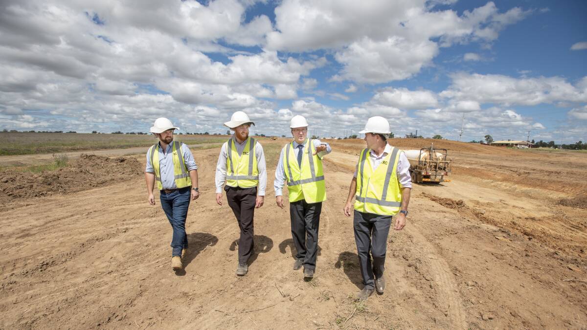 SNATCHED UP: Tamworth Regional Council's Callum Fletcher, Lachan Mackiewicz, mayor Col Murray and Tamworth MP Kevin Anderson at the industrial estate earlier this year. Photo: Peter Hardin 190221PHA021