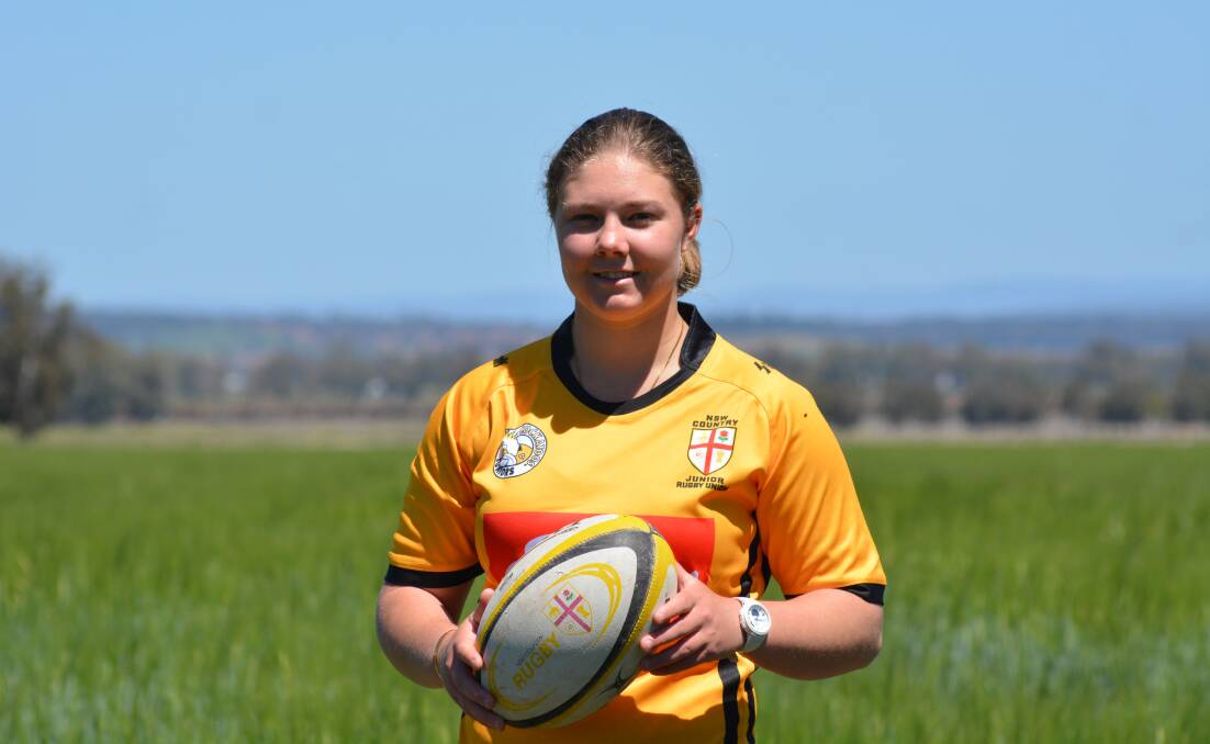 Giving back: Georgia Moore will swap the boots for the coaching pad at next weekend's state 7s championships. Photo: Supplied