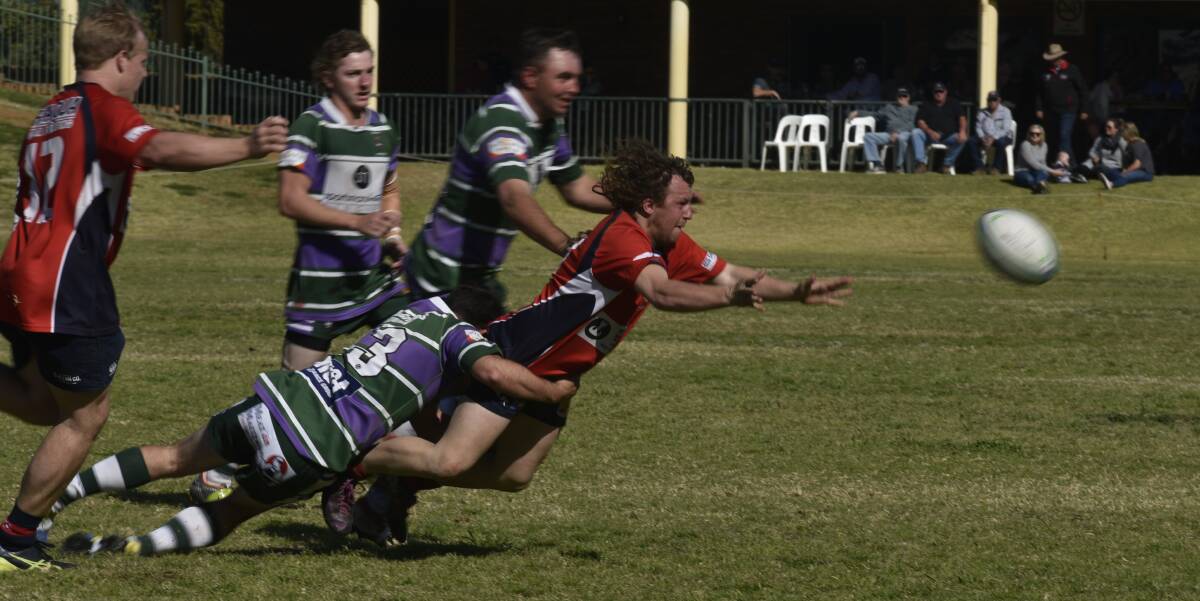 Gunnedah centre Hamish Hockings gets this offload away.
