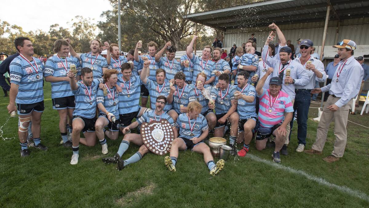 The Narrabri Blue Boars celebrate their premiership win over the Gunnedah Red Devils. Picture by Peter Hardin