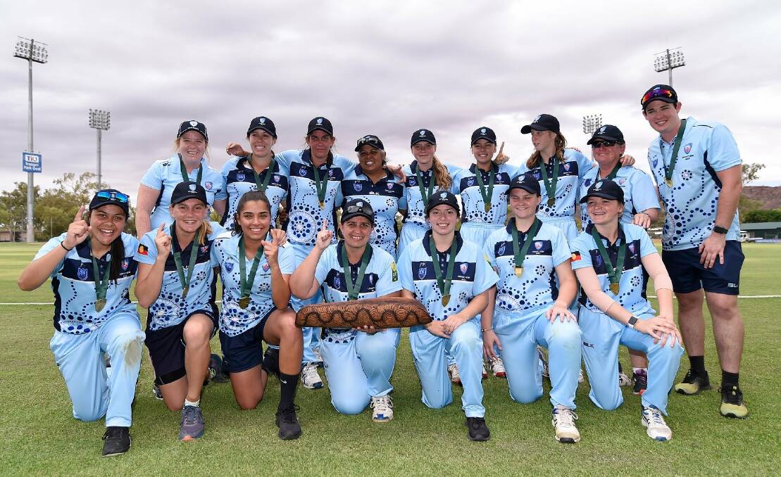 Unbeatable: Zoe Fleming (front second from right) and her NSW team-mates celebrate a 13th straight National Indigenous Championships title.