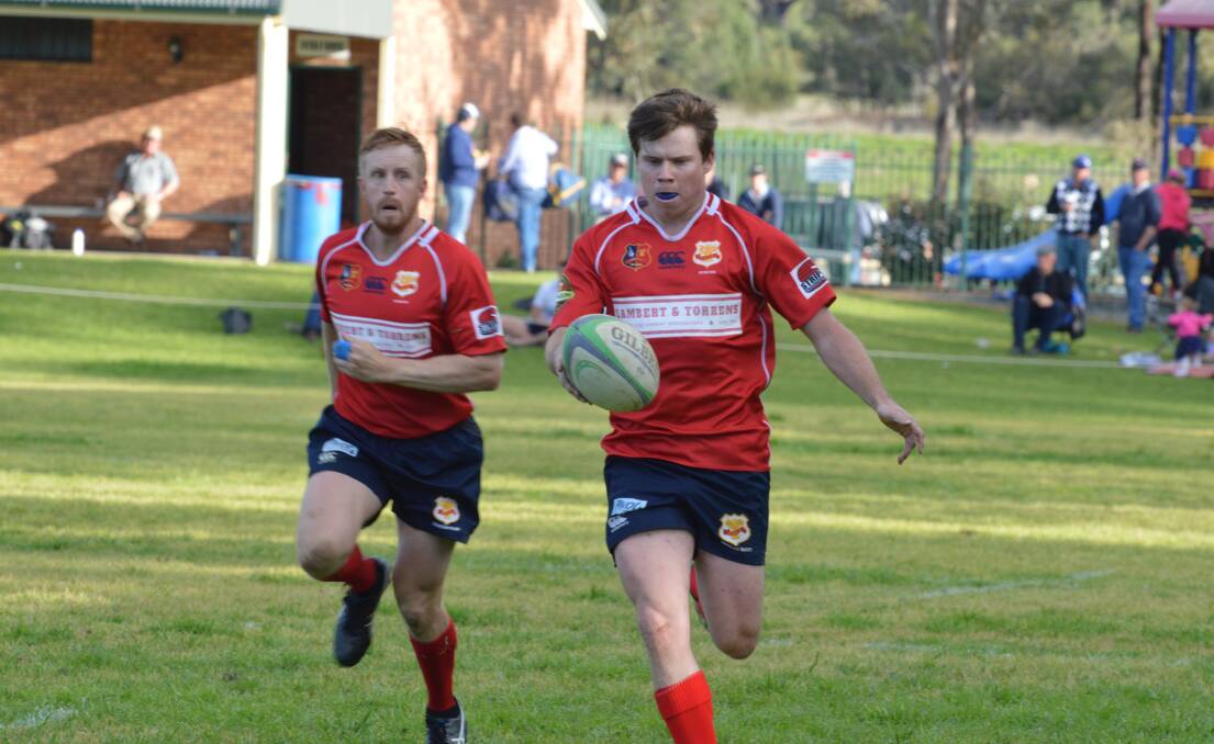 On the attack: Dale (DJ) Morrison shapes up to chip over the top against Quirindi last season. Morrison will start at fullback for the Red Devils against Moree on Saturday.