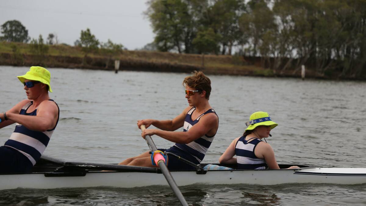 Oarsome effort: James O'Brien (centre) was part of the TAS team that competed at the Taree Summer Regatta earlier this month.