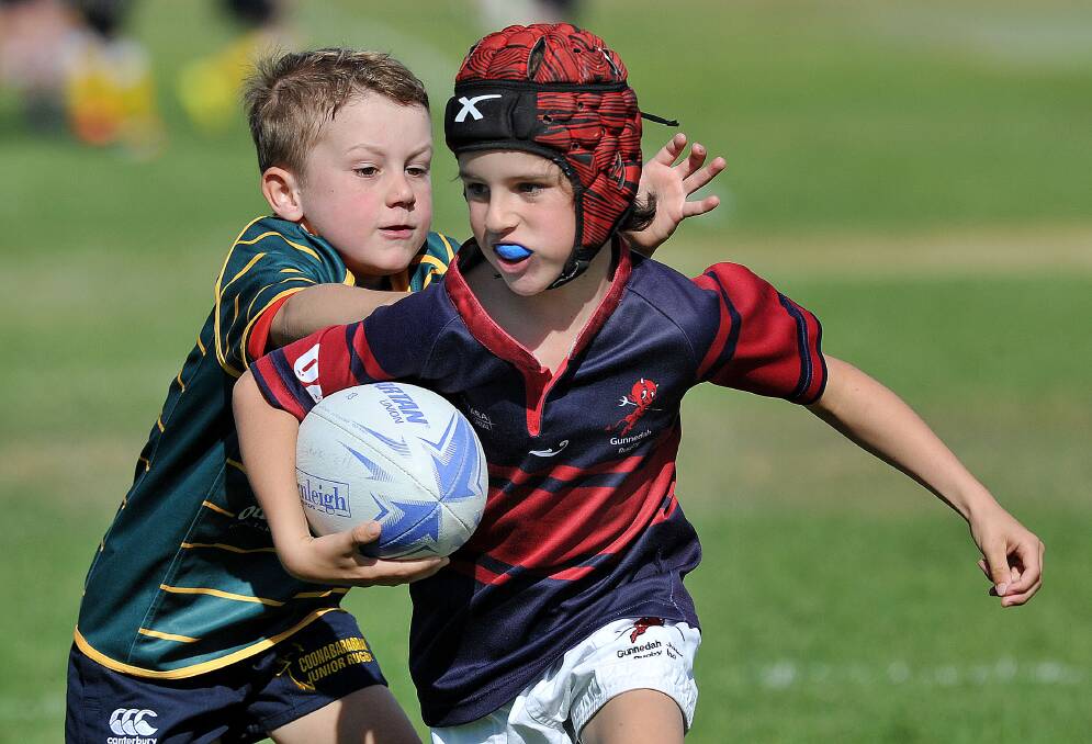 Elusive: Archie Lyle shakes off the Inverell defence playing for the Gunnedah U8s in Sunday's Gunnedah Junior Rugby Carnival. The carnival was the second of the Central North season. Photo: Paul Mathews
