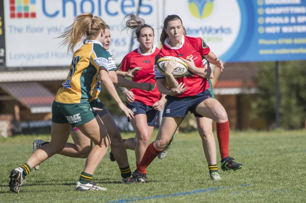 Fleet-footed: The Red Devils' top try-scorer last season, Fiona Laurie picked up where she left off last season scoring a double on Saturday. Photo: Peter Hardin