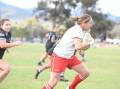 Learning the ropes: Jess Baker races away to score an intercept try for Central North during last month's Country Championships. The Gunnedah native is playing her first season of rugby union.