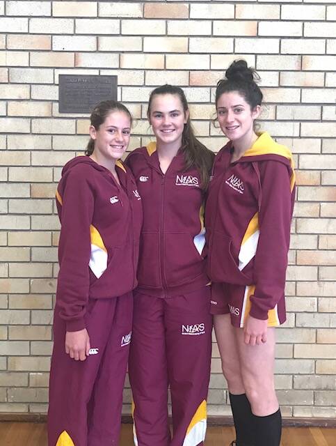 On the ball: (L-R) Chloe Perkins, Bella Gallagher and Eliza Perkins will play for NIAS at this month's Australian Invitational Youth Games (AIYG).