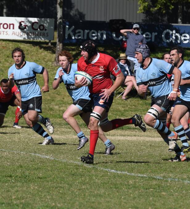 Matt Roseby finds himself in space during last season's semi-final. The Red Devils continued their preparations for the season against Quirindi on Saturday.