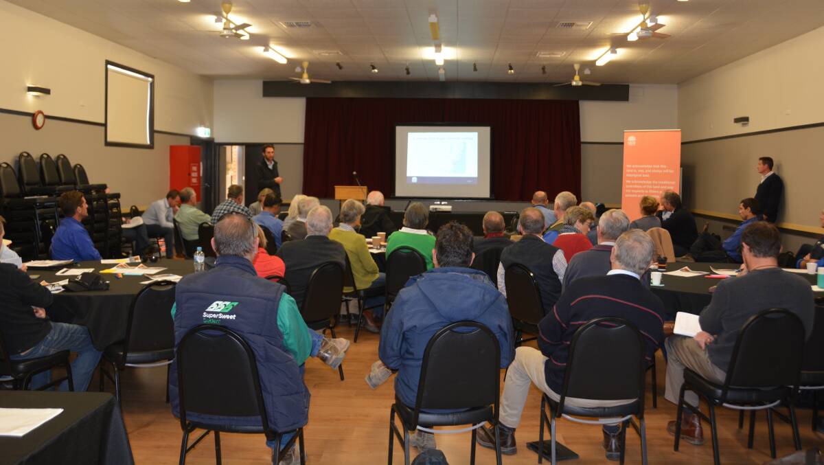 Locals listen to Department of Industry-Water's drought coordinator Michael Wrathall speak at the forum. Photo: Jessica Worboys