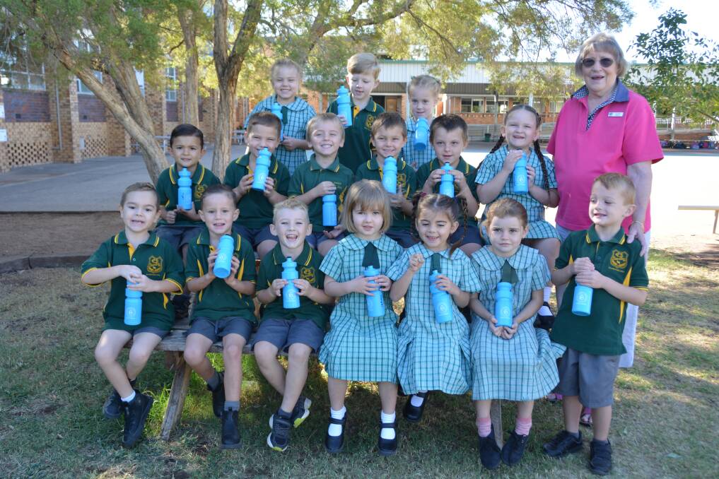 President of the CWA's Namoi Group Yvonne Argent with Gunnedah Public School's kindergarten kids and their new CWA drink bottles. Photo: Jessica Worboys.