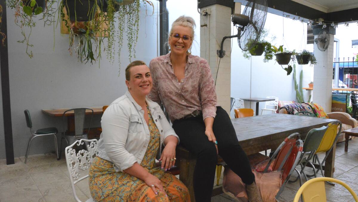 NEW WORKINGS: Bitter Suite Cafe and Wine Bar are offering now carpark deliveries for coffee and cabinet food. Pictured are owners Louisa Riordan and Alice Weinthal. Photo: Jessica Worboys