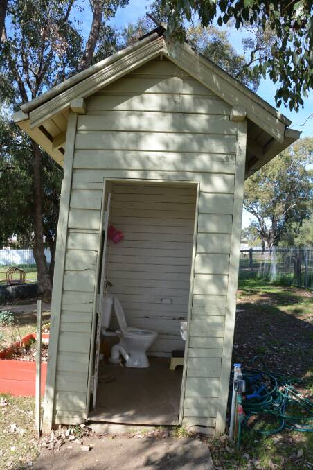 The current toilet is leaning heavily to the right. Photo: Jessica Worboys