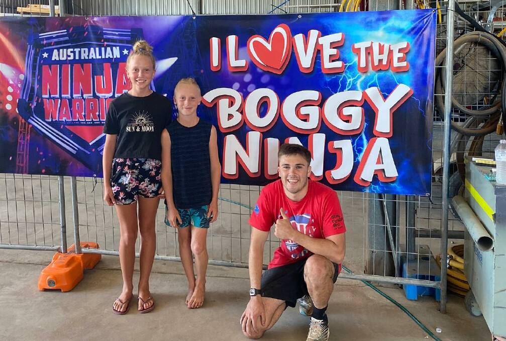 STARSTRUCK: The Boggy Ninja, Cruz Morley (front), with Sienna and Noah, who visited Boggabri with their parents recently. Photo: 100 Campfires
