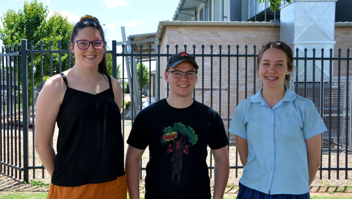 DONE AND DUSTED: HSC students Maddie Coombs, Deagan Marchant and Emma Jerrett are relieved that it's all over. Photo: Jessica Worboys