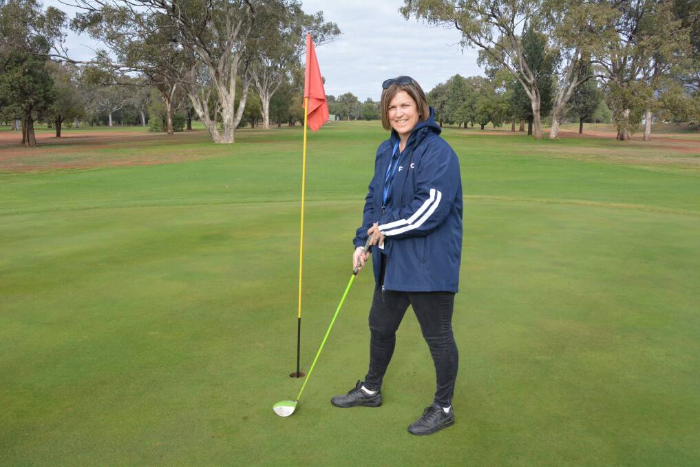 Gunnedah PCYC club director Michelle Gosper prepares to swing at Gunnedah Golf Club. Photo: Jessica Worboys