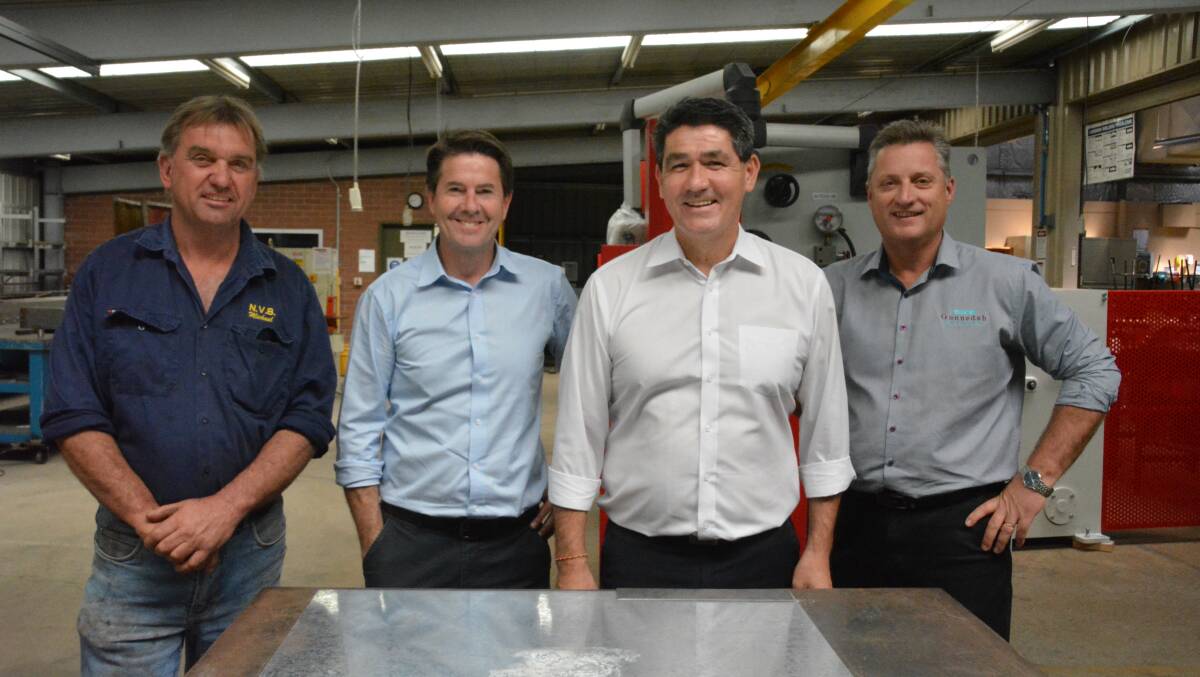 Gunnedah Chamber of Commerce's Michael Broekman, Tamworth MP Kevin Anderson, Minister for Skills and Tertiary Education Geoff Lee and Gunnedah mayor Jamie Chaffey in one of Gunnedah TAFE's classrooms. Photo: Jessica Worboys