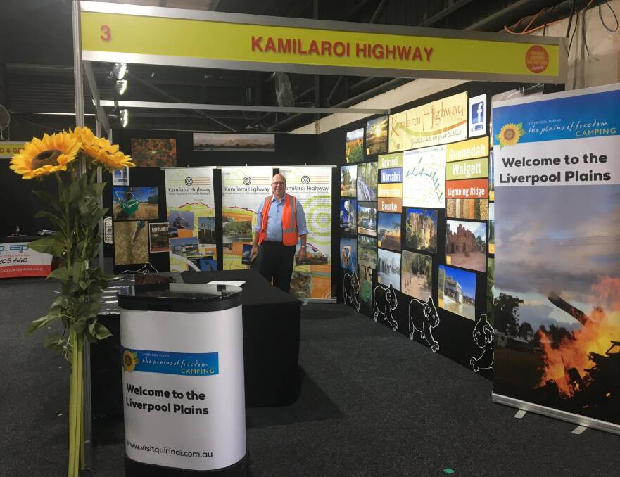 Gunnedah tourism supervisor Chris Frend at the Kamilaroi Highway display at the Newcastle Caravan and Camping Show. Photo: supplied.