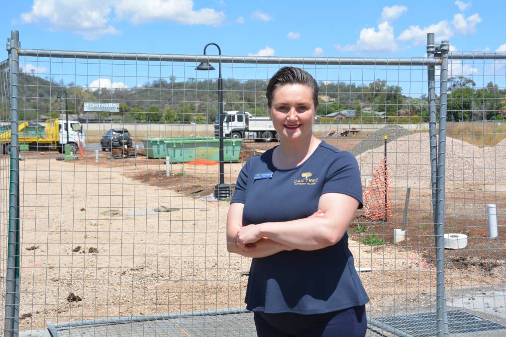 WORKS UNDERWAY: Oak Tree Retirement Village Gunnedah manager Kathryn Blinman in front of the construction zone. Photo: Jessica Worboys