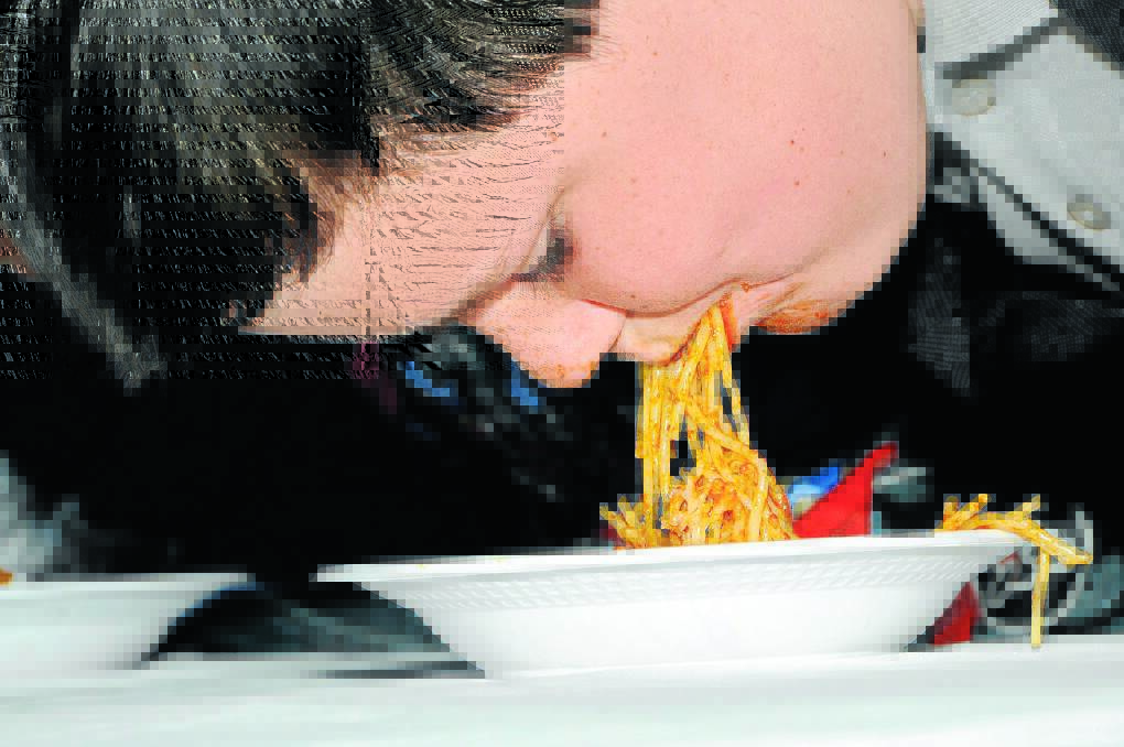 Pasta eating competitions were popular at Porchetta. Photo: Peter Lorimer