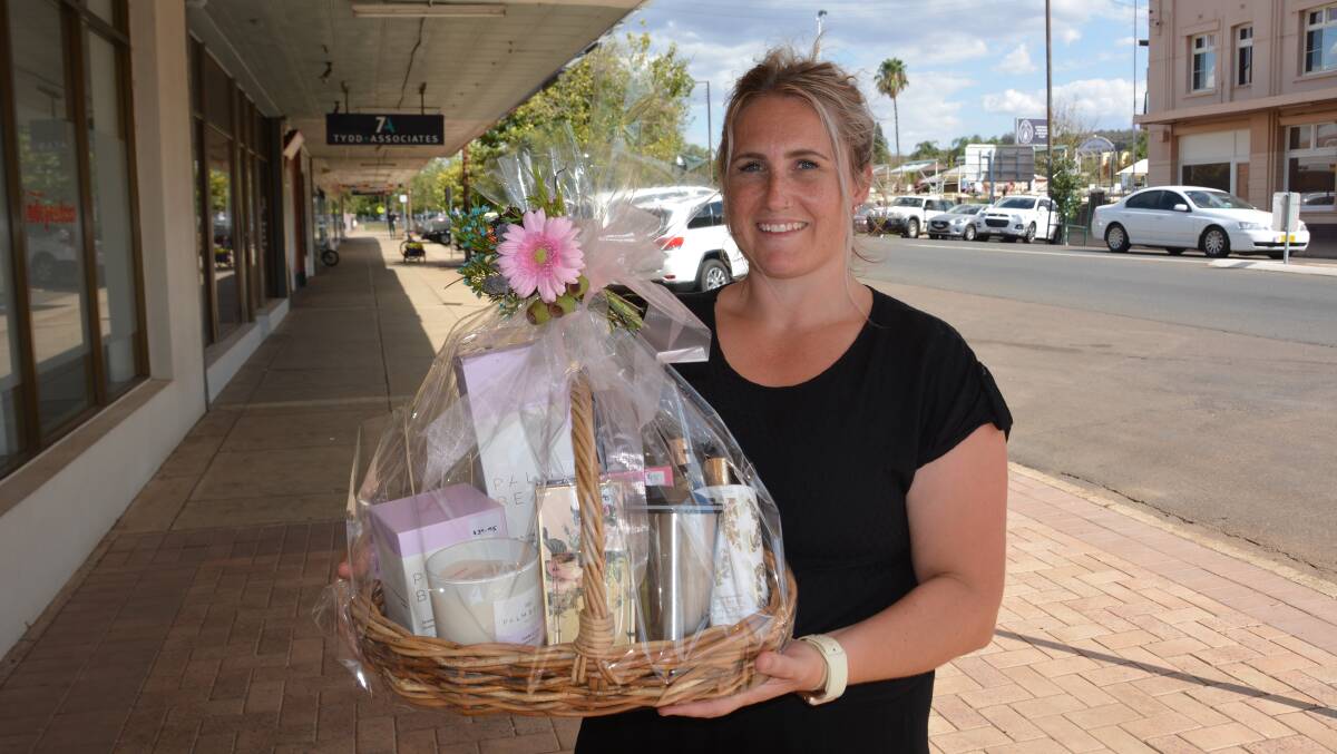 The Nurtured Village's Kaitlyn Bywater with an example hamper. Photo: Jessica Worboys