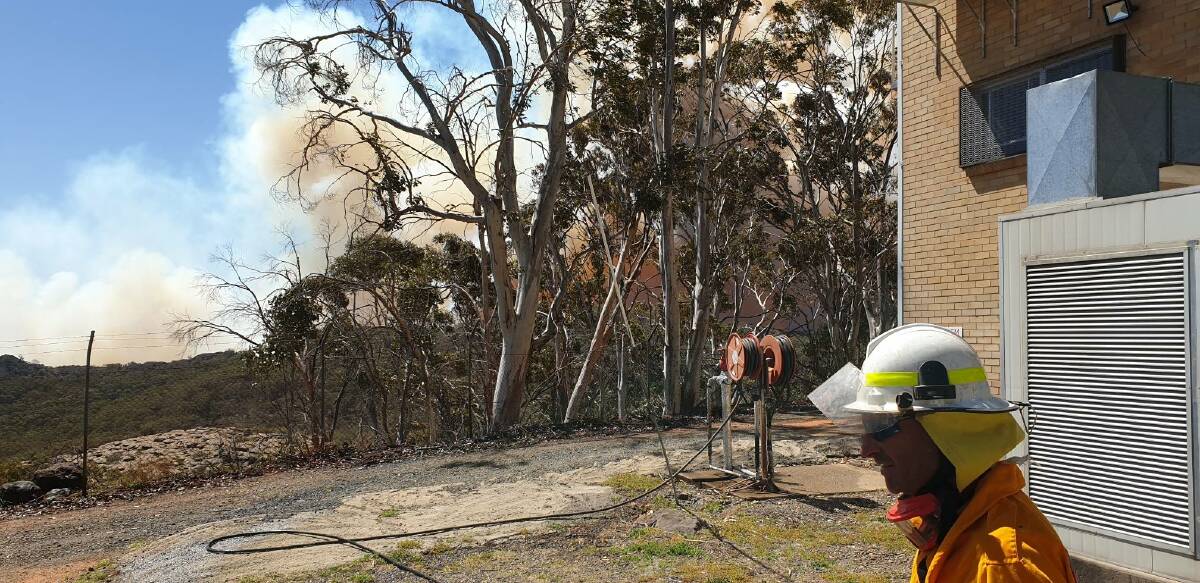 A firefighter at the Mount Kaputar National Park fire. Photo: Narrabri Rural Fire Service Facebook page