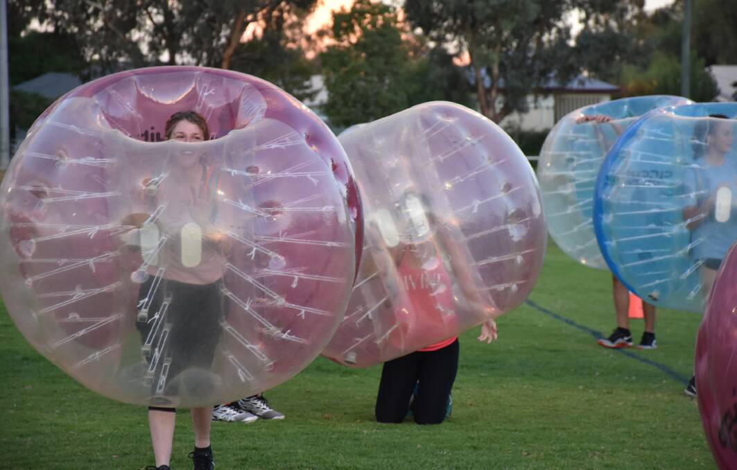 Neon bubble soccer was a very popular activity during the winter school holidays. Photo: supplied