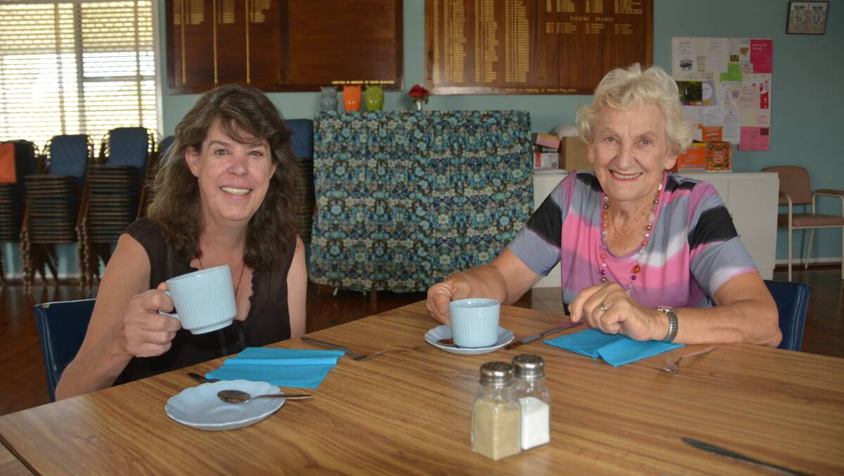 GOOD SAMARITANS: Kate Perceval and CWA Gunnedah's Coralie Howe are hoping locals will come down for a free meal at the CWA Hall on Barber Street. Photo: Jessica Worboys