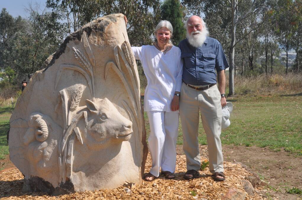 Sculptors Joan Relke and Carl Merten next to one of the sculptures in Pensioners Hill at the official unveiling in 2012.