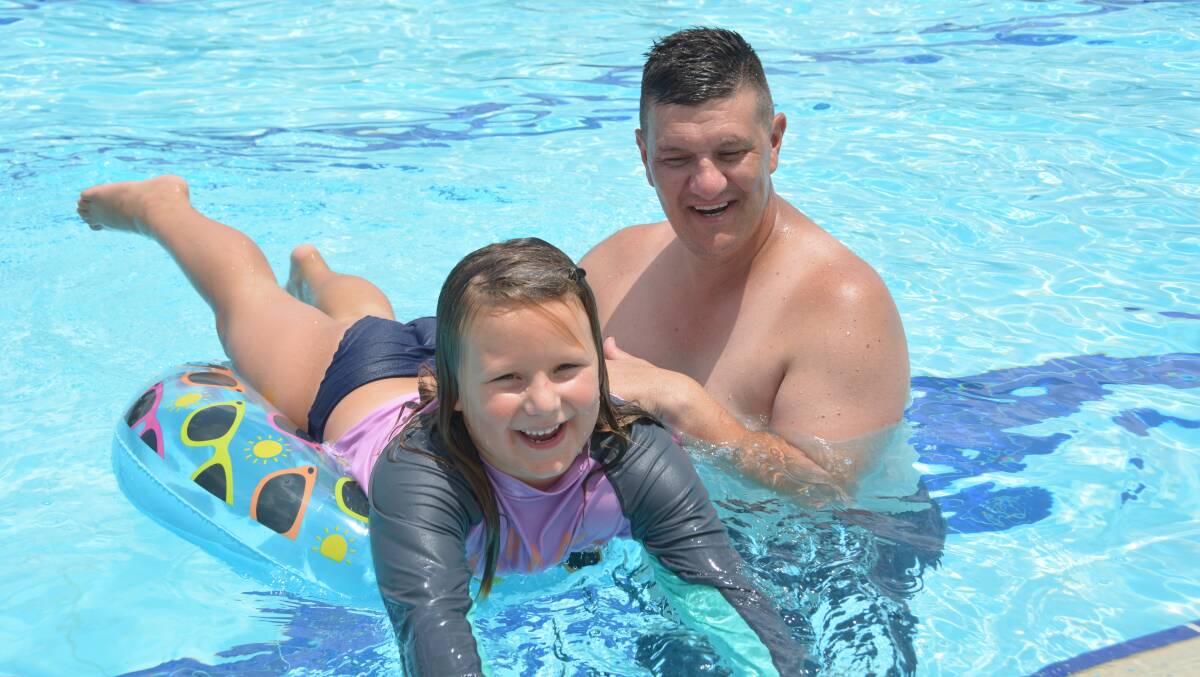 Rosie and Leigh Keating were just two of over one thousand people at the pool on Sunday. Photo: Jessica Worboys