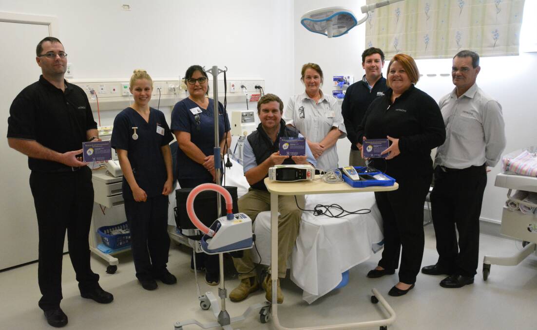 Representatives from Hitachi, Rice Construction, and Gunnedah hospital in the hospital's maternity ward with the new equipment. Photo: Jessica Worboys