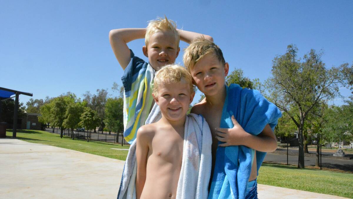 Darcy, Lewis and Charlie Mainey fresh out of the pool on Tuesday morning. Photo: Jessica Worboys