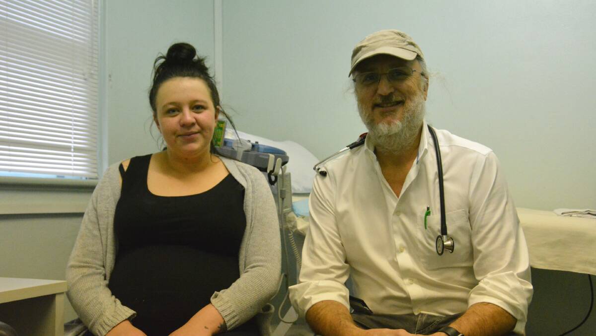 Dr Rob Parsons with one of his current pregnant patients, Tayte Chown. Photo: Jessica Worboys 