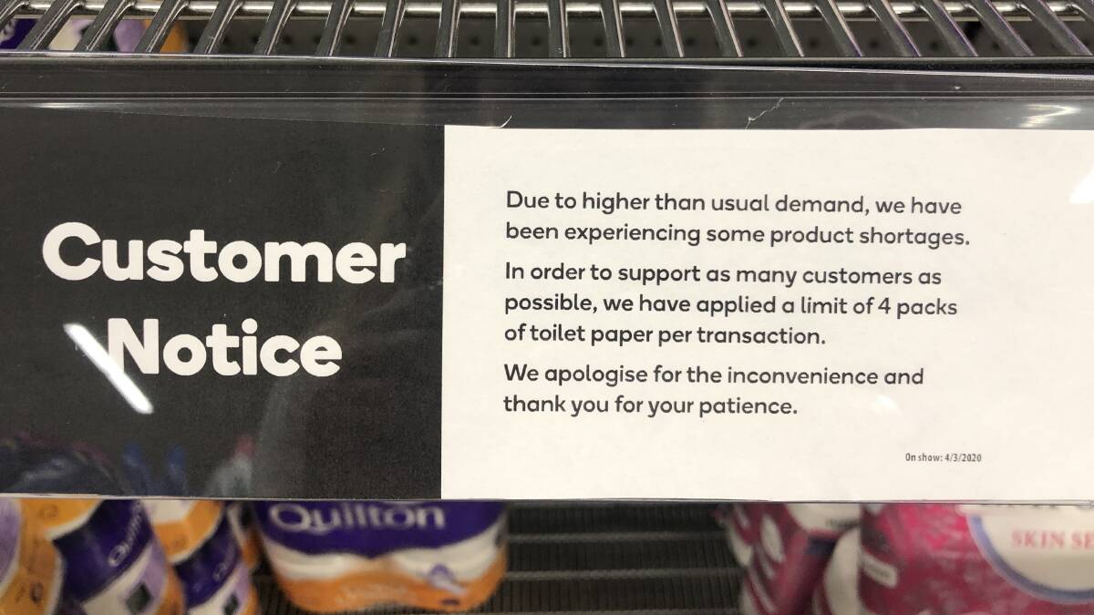 The sign on the toilet paper shelf at Gunnedah Woolworths. Photo: Jessica Worboys