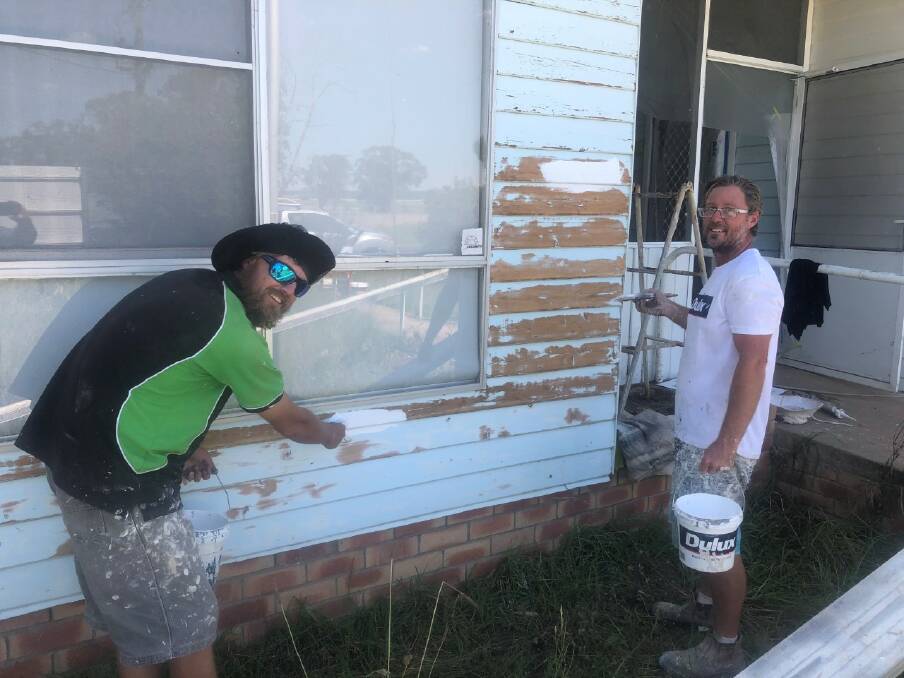 Local contractor Shannon Piggott (right) and his crew got stuck into giving the CWA building a makeover during the past week. Photo: supplied