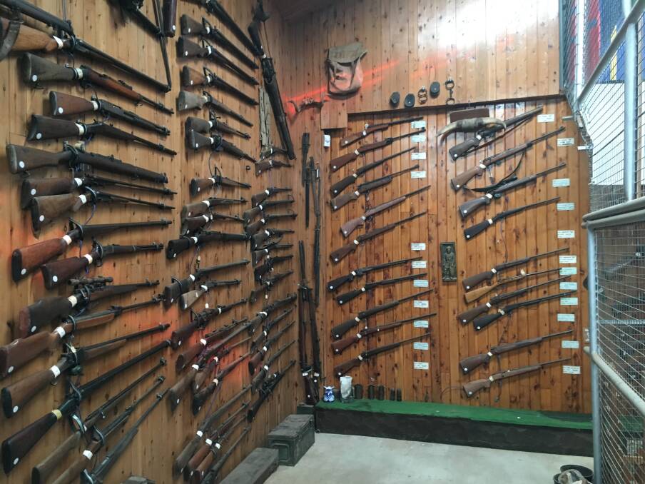 Visitors to the Gunnedah Rural Museum stand behind the metal cage, and are unable to access the extensive collection of firearms. Photo: Trent Donoghue