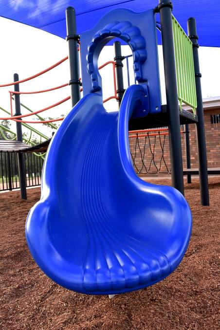 The bright blue slide was a striking feature of the playground when it was installed. Photo: Gunnedah Shire Council