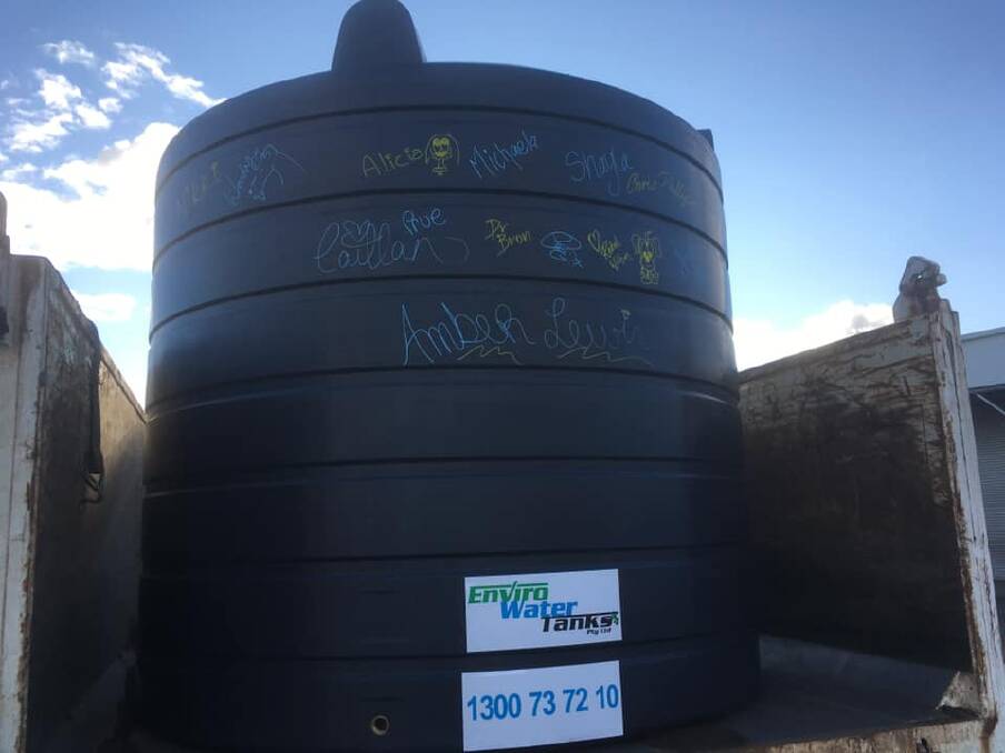 The water tank with signatures. Photo: supplied