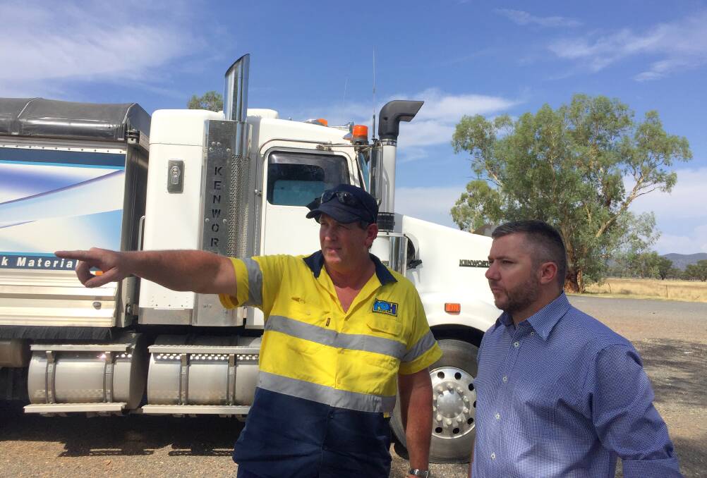 Gunnedah truck driver Mark Hall discusses safety concerns with Tamworth candidate Jeff Bacon. Photo: Supplied