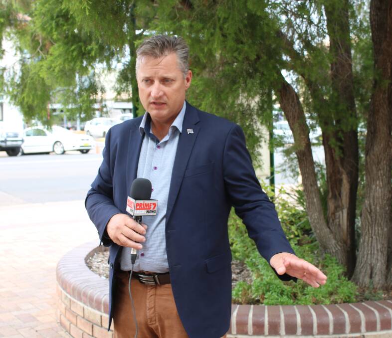 Gunnedah mayor Jamie Chaffey speaks to the media at the NSWNMA rally on Thursday.