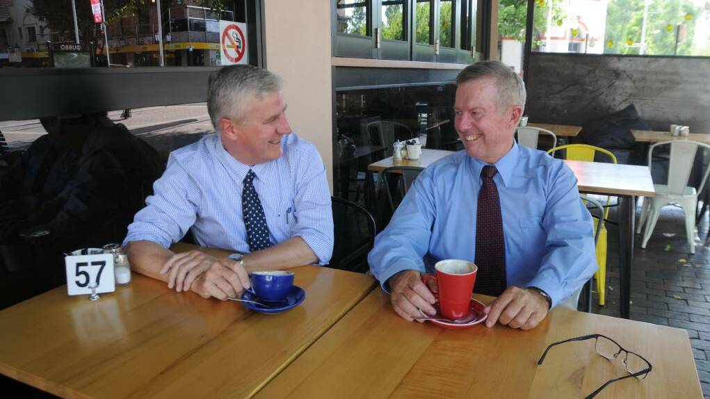 Mark Coulton (right) with Riverina MP Michael McCormack during a visit to Dubbo in February 2017. On Thursday Mr McCormack, now Deputy Prime Minister, informed Mr Coulton of his promotion. Photo: JENNIFER HOAR