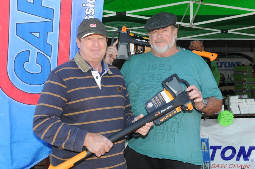 Rob Stockdale, Nabiac, and Greg Hoss, Branxton, check out the merchandise at a recent field days.