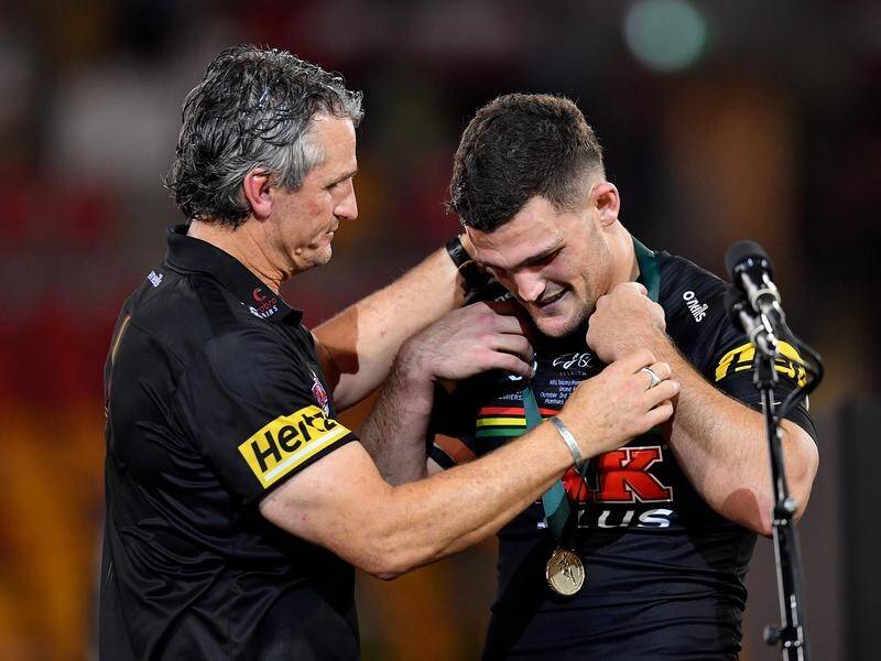 Premiership winner Nathan Cleary (r) says he won't play in round one if his shoulder is not fixed.
