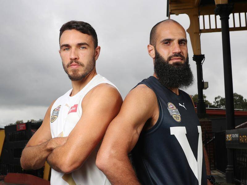 Tigers Shane Edwards (l) and Bachar Houli look unlikely to travel as Victoria's AFL sides relocate.