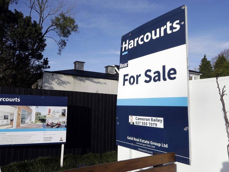 The average NZ house price has dipped back into six figures, the first time since September. (AP PHOTO)